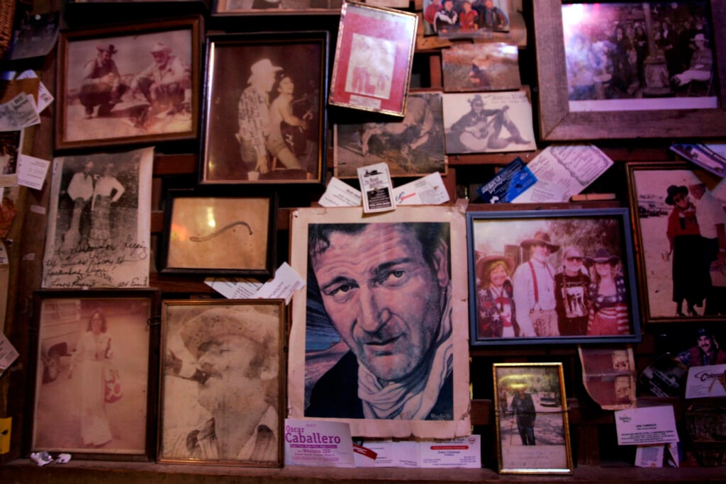 Pictures Of Musicians And Country Stars Cover The Walls Inside The Bar In Luckenbach