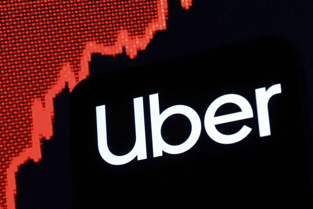 Illustration Shows Uber Logo And Rising Stock Graph