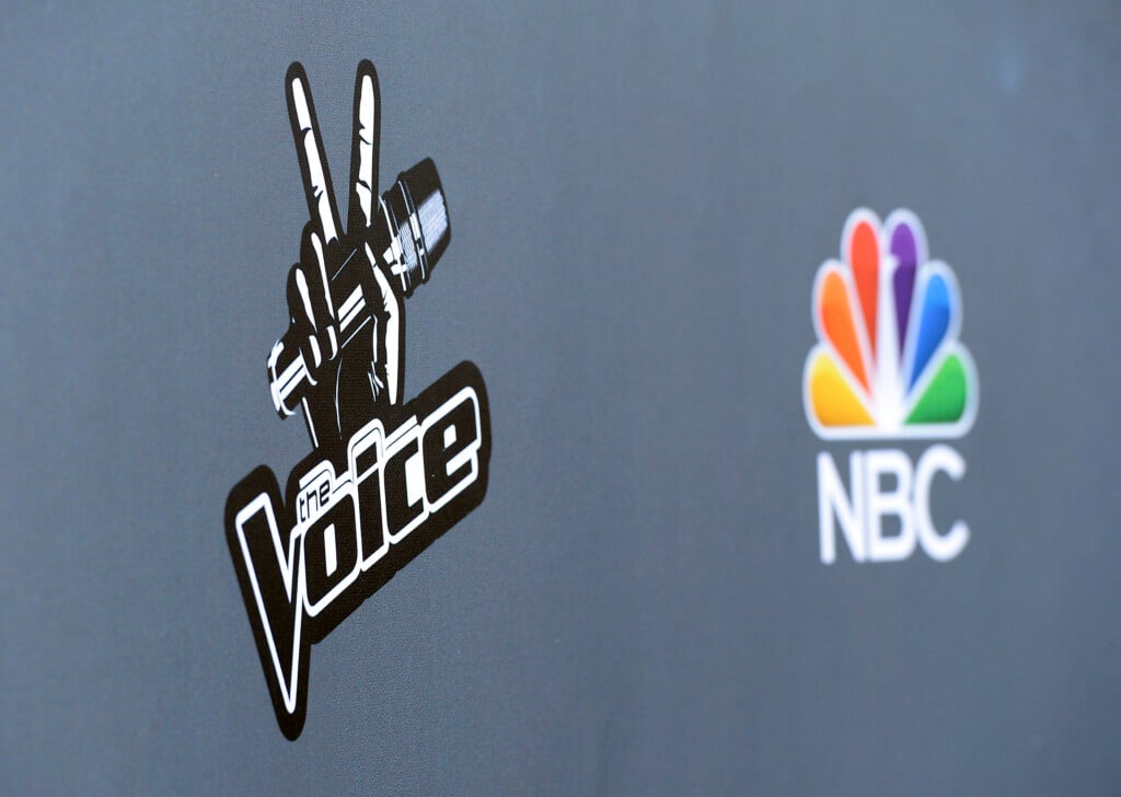 The Logos Of Television Show "the Voice" And National Broadcasting Company (nbc) Are Seen During A Media Event In Universal City