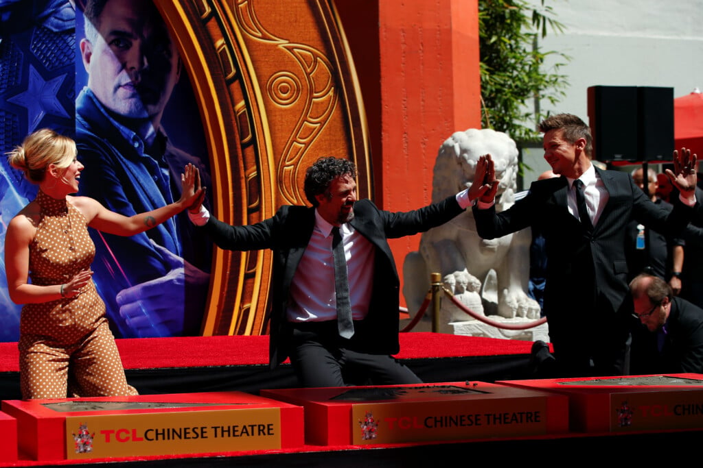 Actors Robert Downey Jr., Chris Evans, Mark Ruffalo, Chris Hemsworth, Scarlett Johansson, Jeremy Renner And Marvel Studios President Kevin Feige Place Their Handprints In Cement At A Ceremony At The Tcl Chinese Theatre In Hollywood
