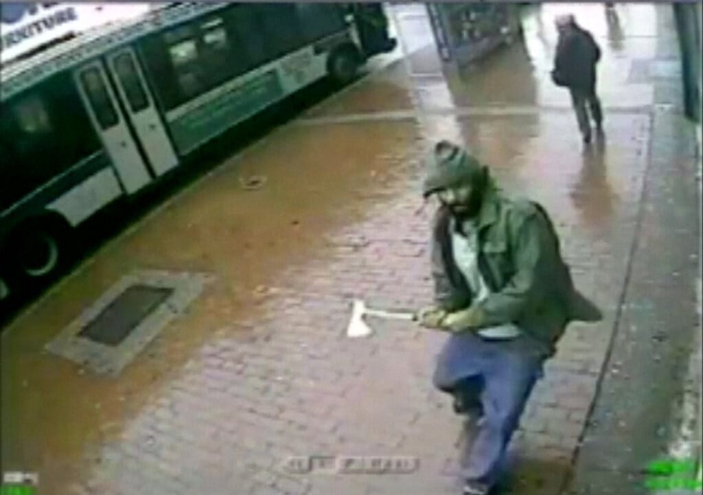 A Man Holding A Hatchet Is Seen In A Still Image From Surveillance Video Provided By The New York Police Department