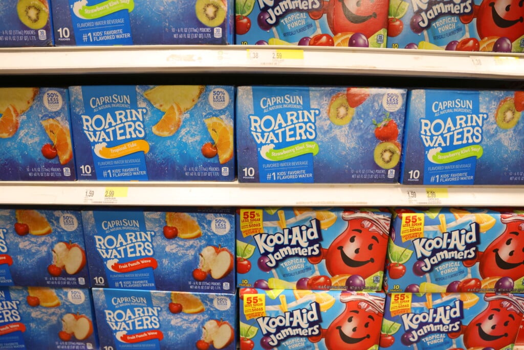 Packages Of Capri Sun And Kool Aid, Brands Owned By The Kraft Heinz Company, Are Seen In A Store In Manhattan, New York