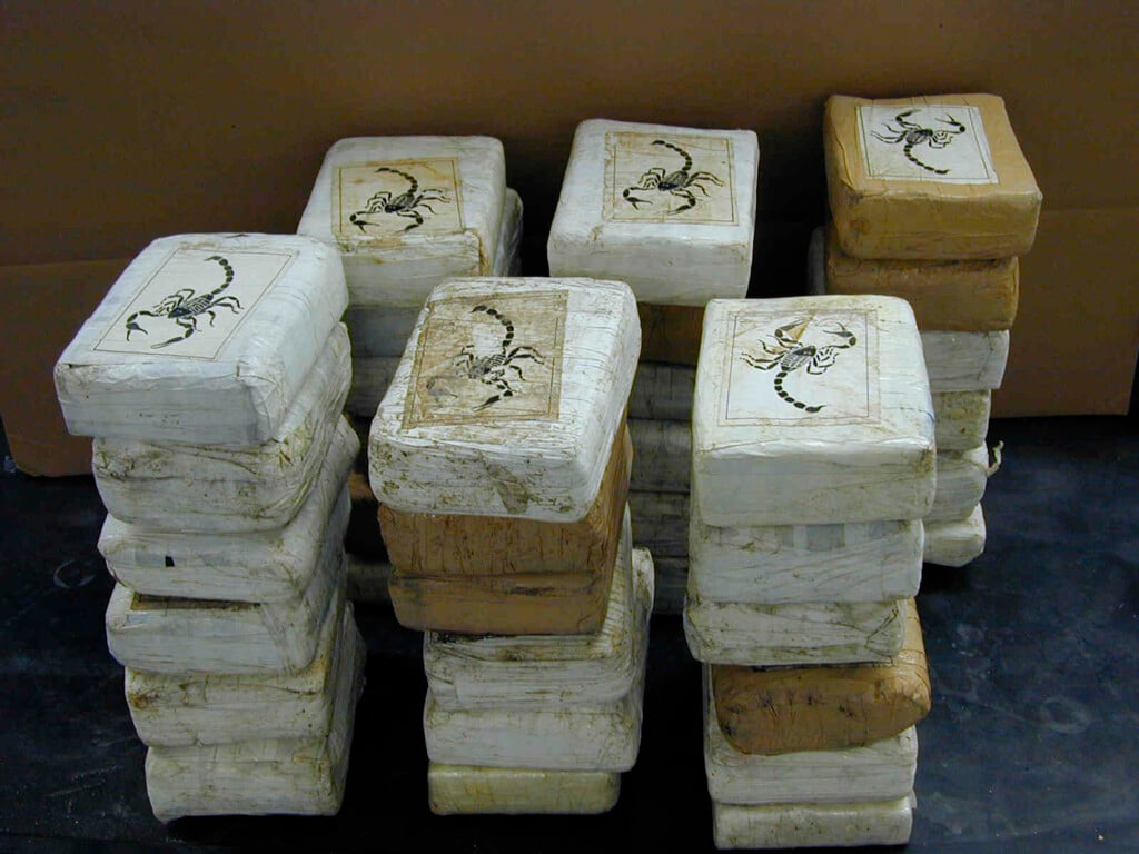 Powdered Cocaine Packaged Into Bricks And Labelled With An Image Of A Scorpion Are Pictured In This Undated Handout Photo