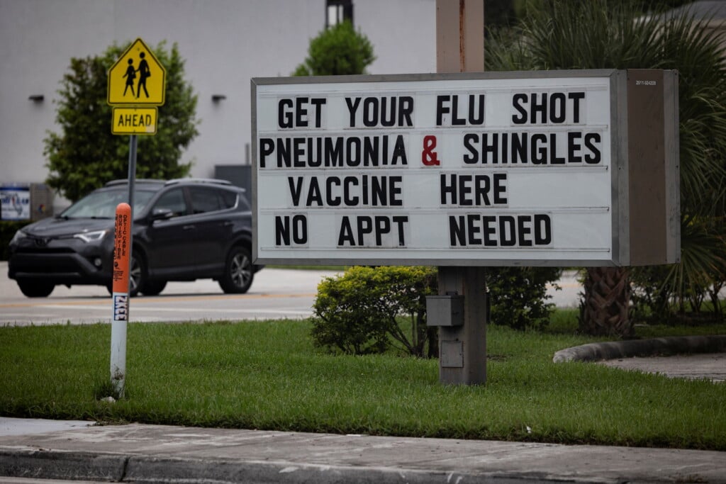 A Sign Advertises Vaccine Shots In Miami
