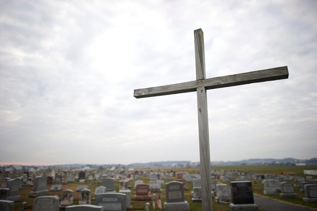 A Cross And A Graveyard Are Seen In Bart Township, Pennsylvania