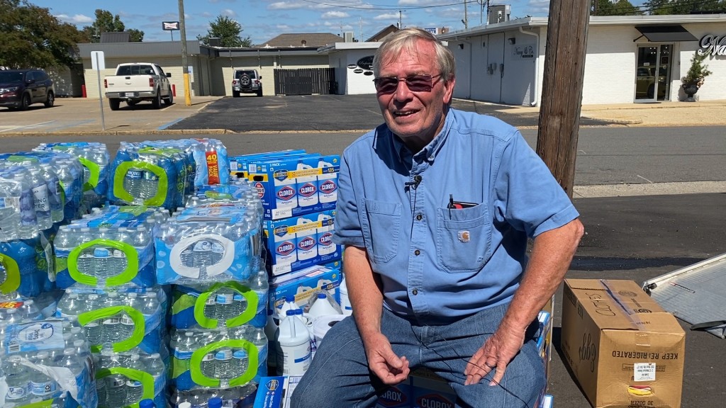 Mayor Of Northport Bobby Herndon With The Donated Water Packs