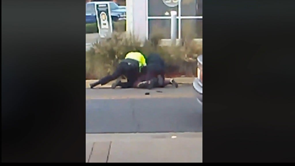 Police Beating Woman