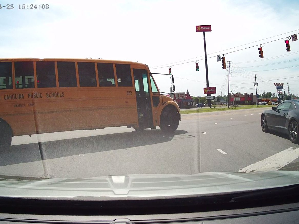 ONLY ON 3: School bus driver caught on cam running red - WWAYTV3