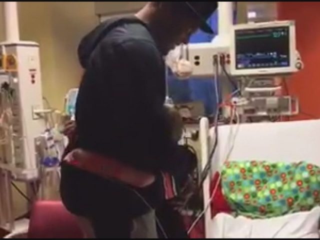 Cam Newton visits sick fan in hospital