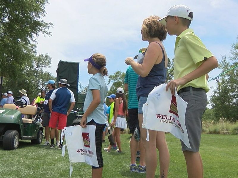 Mason McFarland getting autographs at the Wells Fargo Championship on May 4