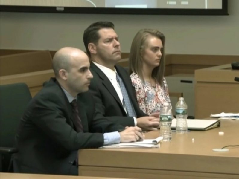 Michelle Carter sits with her attorneys during her trial on her role in the death of Conrad Roy III on June 13