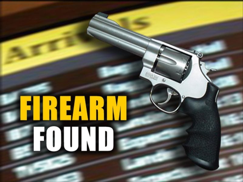 fire arm firearm found gun weapon airport arrival board departure tsa