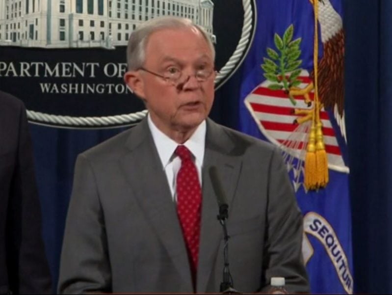 Jeff Sessions discusses leaks of confidential information during a news conference at the Department of Justice on Aug. 4