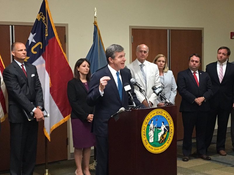Gov. Roy Cooper addresses the media about GenX during a news conference in Wilmington on July 24