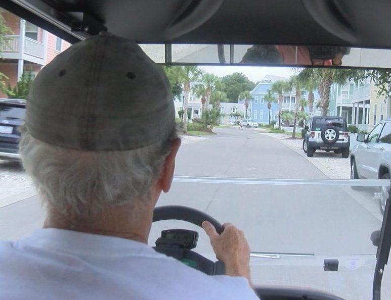 John Layland driving his golf cart in a 10 mph zone in Carolina Beach on July 26