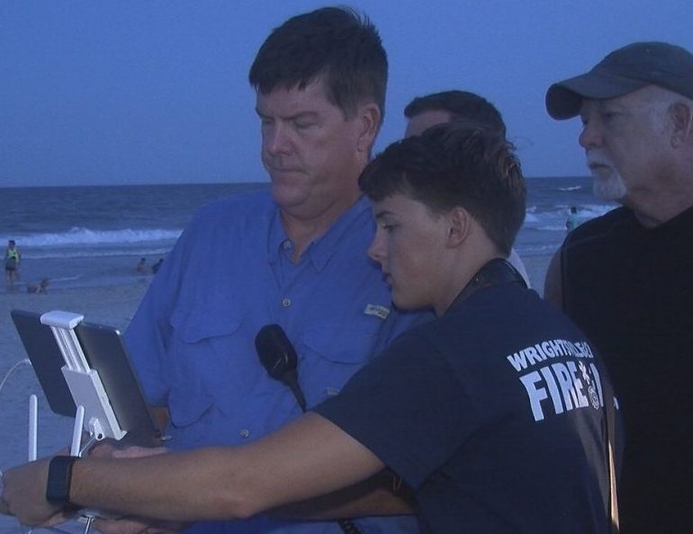 Wrightsville Beach Ocean Rescue performing a practice search and rescue using a drone controlled from a tablet on July 12