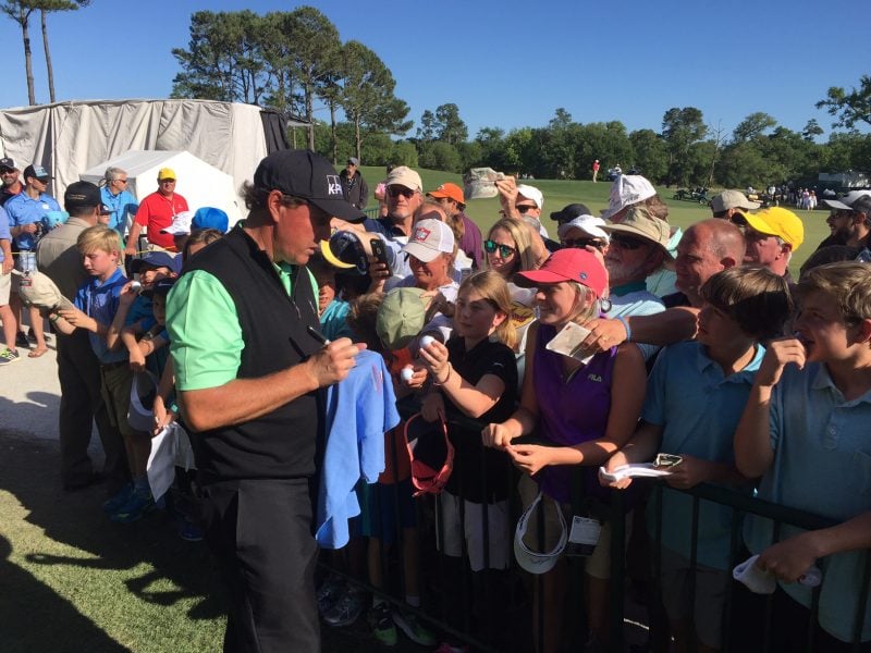 Phil Mickelson signs autographs after finishing play in the Wells Fargo Championship on May 7