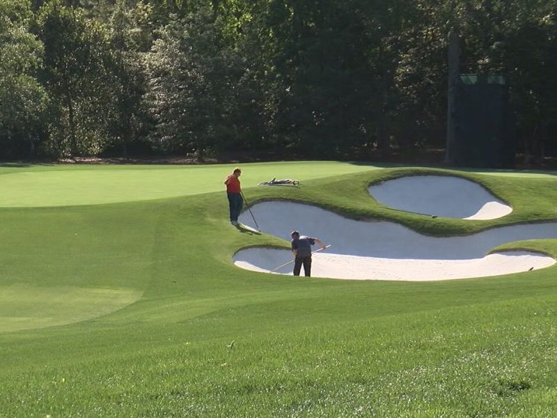 Crews work on a bunker on the 11th hole at Eagle Point Golf Club ahead of the 2017 Wells Fargo Championship. (Photo: WWAY)