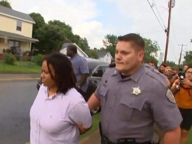 A Durham County deputy arrests Takiyah Thompson on Aug. 15