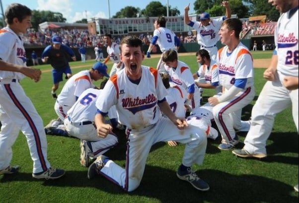 Whiteville baseball players celebrate after winning the 1A State Championship on June 3
