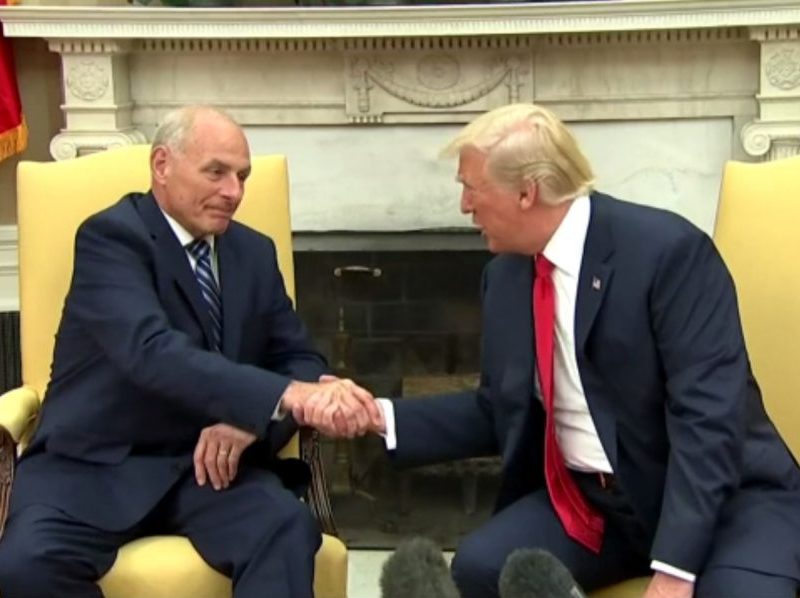 John Kelly shakes hands with President Donald Trump in the Oval Office shortly after being sworn in as White House Chief of Staff on July 31