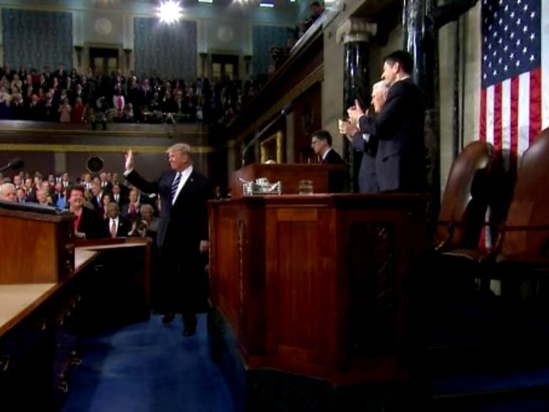 Donald Trump waves to audience ahead of address to joint session of Congress