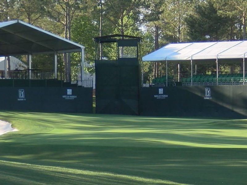 Seating and a broadcast tower flank the green at Eagle Point Golf Club's 16th hole. (Photo: WWAY)