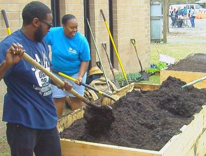 Volunteers came from all over Wilmington to help out with the community garden.