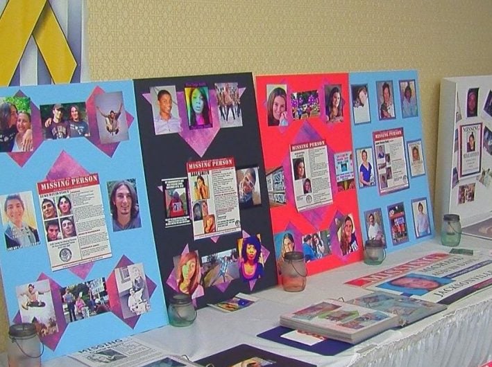 Displays by families honor missing loved ones at the 13th Annual Missing Persons Conference in Wilmington in March 2017. (Photo: Basil John/WWAY)