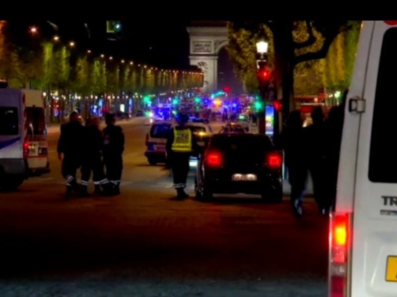 Police respond to a shooting on the Champs-Elysees in Paris on April 20