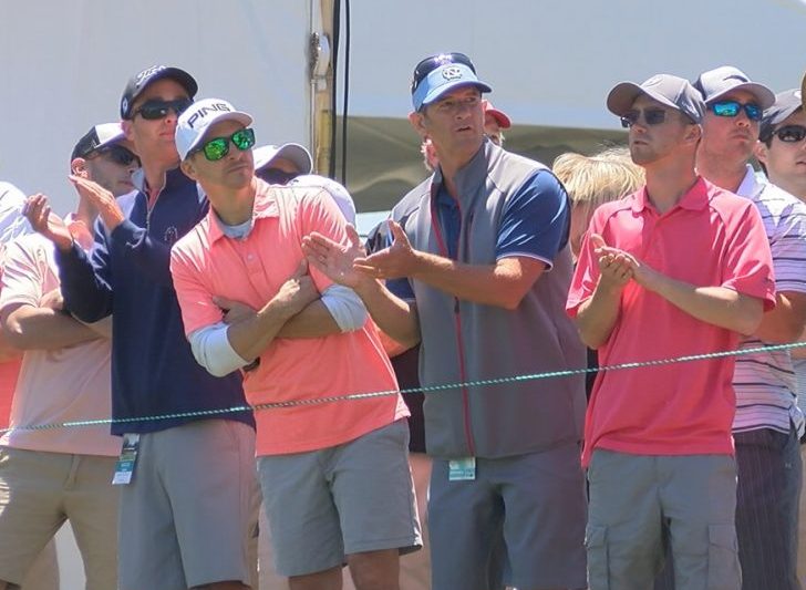 Spectators watching and applauding at the Wells Fargo Championship on May 7