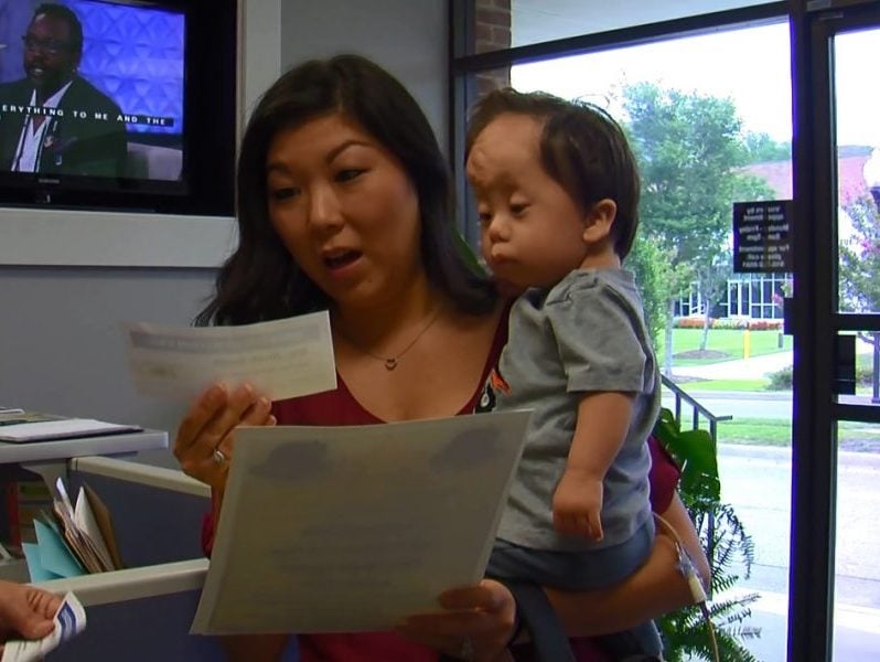 Jinah Smith and her son Logan accept the prize package for the WWAY Beat the Heat contest on Aug. 3