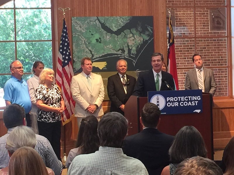 Gov. Roy Cooper discusses offshore energy exploration in Atlantic Beach on July 20