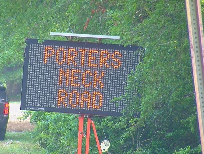 A sign on Porters Neck Road warning of delays during the championship.