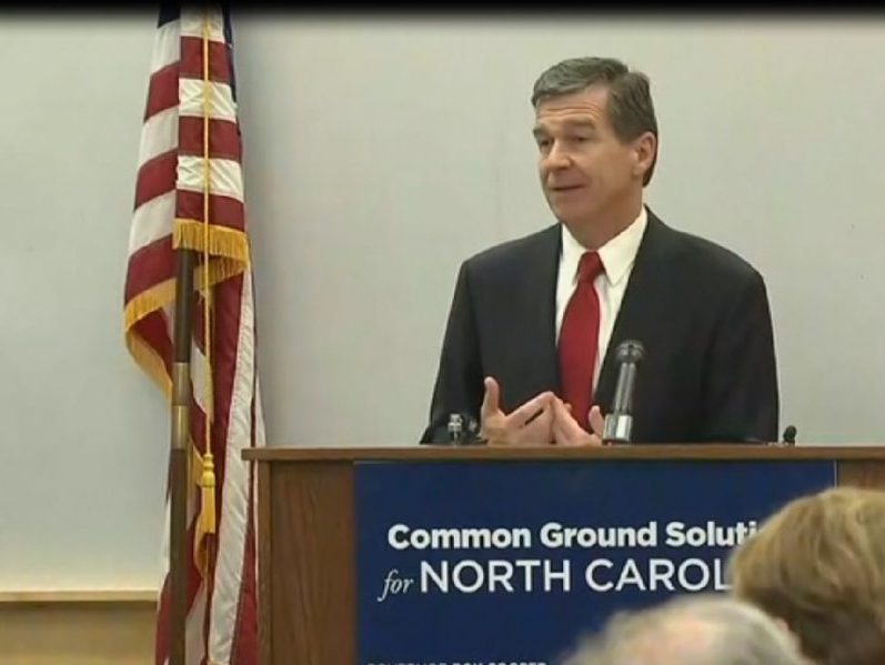 Roy cooper in front of podium roy cooper speaking roy cooper addressing crowd