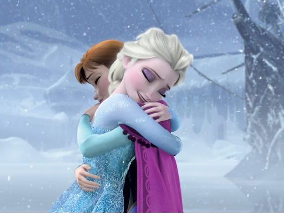 Elsa and Anna embrace at the end of Disney's "Frozen." (Photo: Disney)