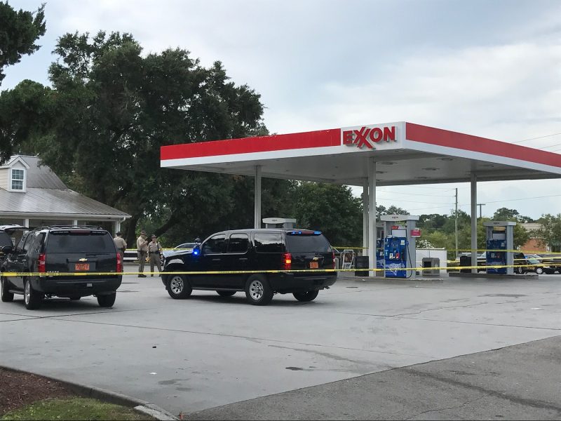 New Hanover County deputies investigate after a woman's body was found inside a car at a Porters Neck gas station on July 28