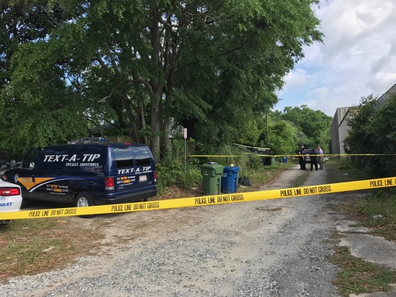 Wilmington Police investigate the discovery of a man's body on Hooper Street on April 27