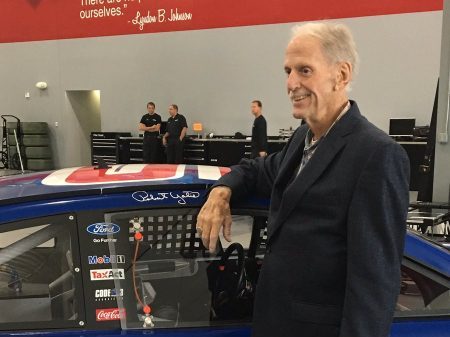 Robert Yates poses next to a car on Aug. 14