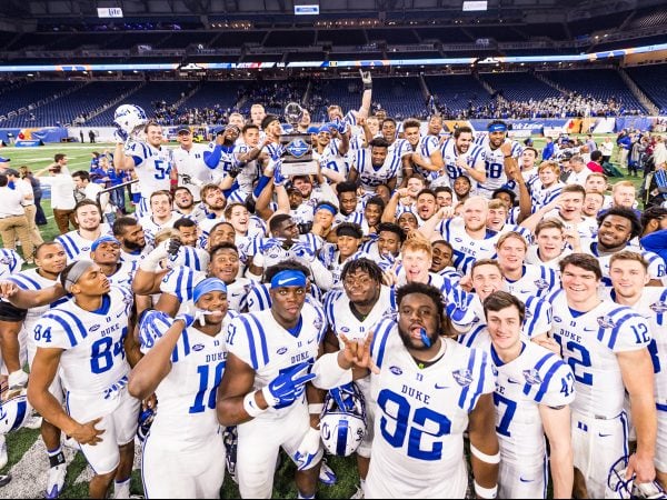 The Duke football team celebrates its victory over Northern Illinois in the Quick Lane Bowl in Detroit on Dec. 26
