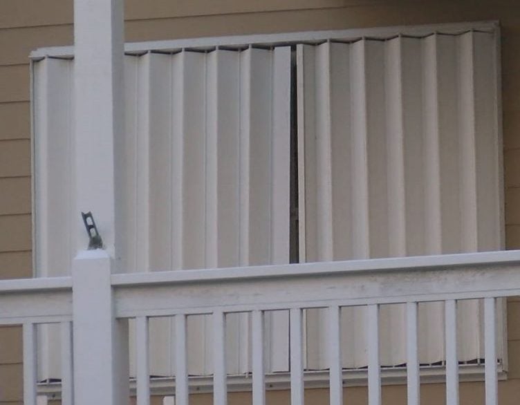 Some homes in Carolina Beach already have their windows and doors boarded up on September 7