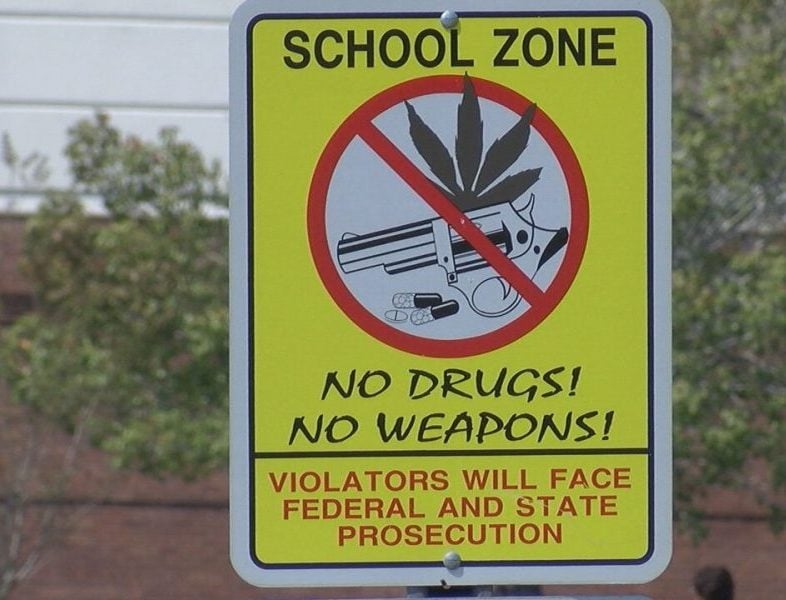 A sign on the campus of East Columbus High School saying no weapons are allowed on September 22