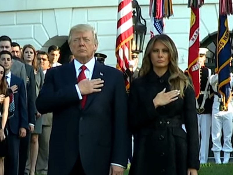 President Donald Trump and First Lady Melania Trump take part in a moment of silence at the White House on Sept. 11