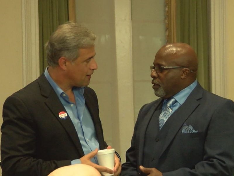 Wilmington Mayor Bill Saffo (left) talks with Wilmington City Council candidate Clifford Barnett as they watch election returns on Nov. 7