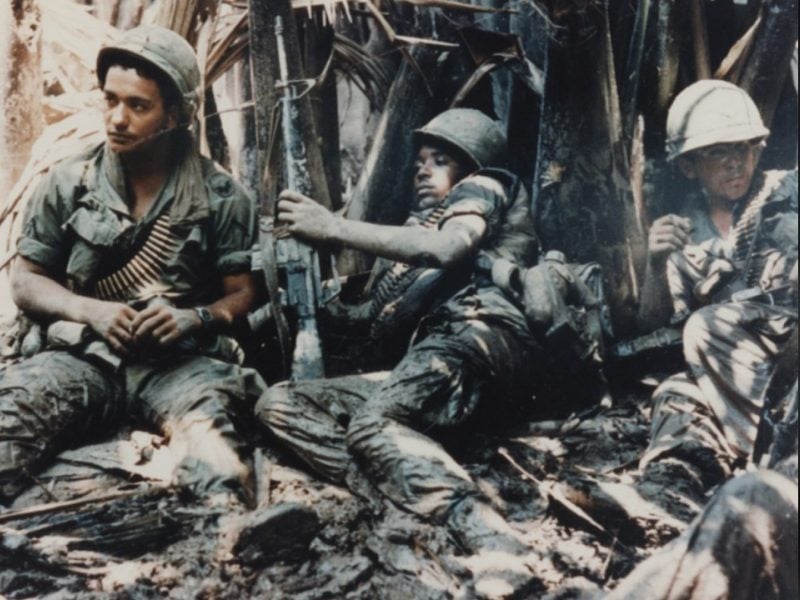 US Army soldiers take a break while on patrol during in Vietnam in an undated photo. (Photo: R.W. Trewyn)