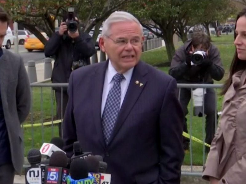 Sen. Bob Menendez (D-NJ) talks to reporters after leaving his bribery trial on Nov. 13
