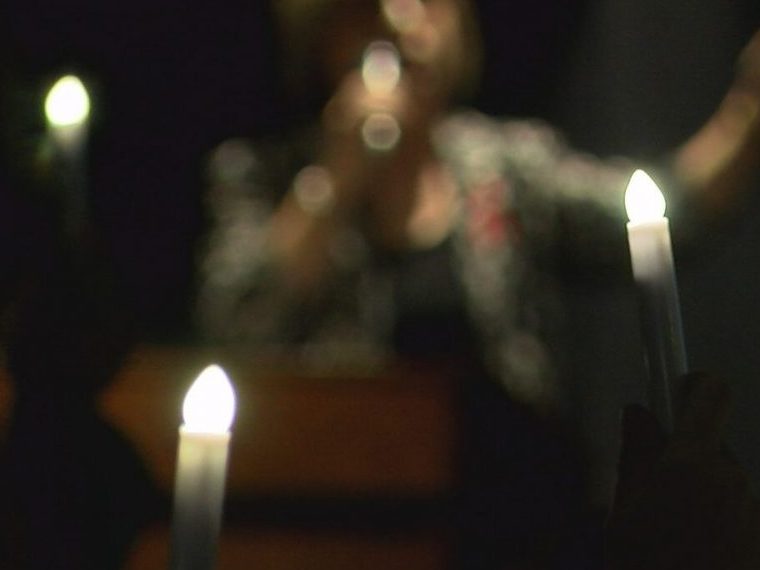 Many families and members of the community raised their candles high as they remembered their loved ones on November 17
