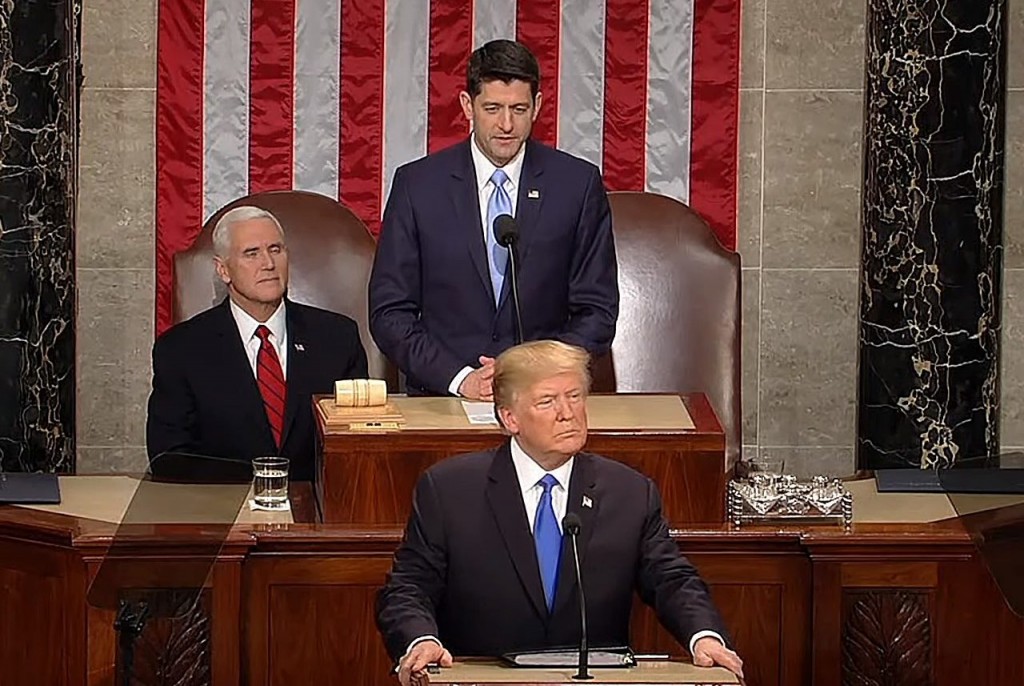 House Speaker Paul Ryan introduces President Donald Trump as Vice President Mike Pence watches before the State of the Union on Jan. 30