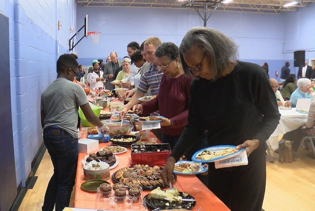 Dozens attend the Potluck for Peace at the MLK Center in Wilmington on January 11