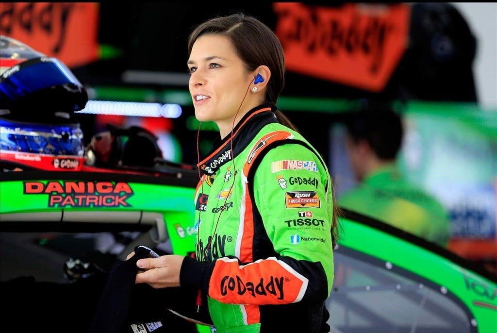 Danica Patrick stands in the garage during practice for the NASCAR Sprint Cup Series Kobalt 400 at Las Vegas Motor Speedway on March 7